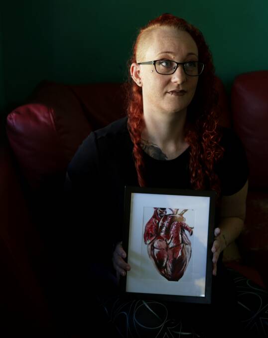 JOURNEY: Victoria Campbell with a piece of art she used to convey her emotions about borderline personality disorder. Picture: Simone De Peak