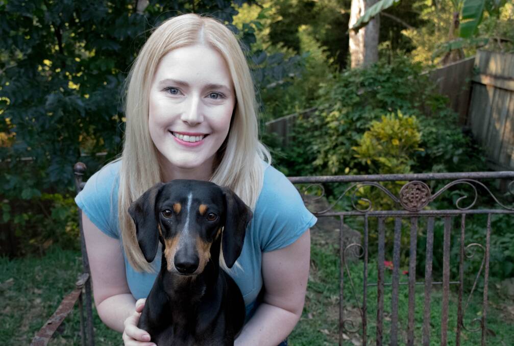 BOND: Happy Paws Happy Hearts co-founder and program director Zoe Black and rescue dog Flex.