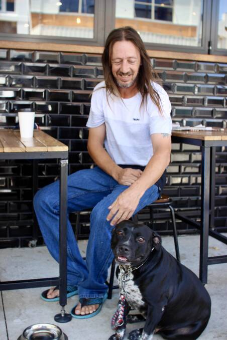 HAPPY: Dale and his dog Halo have found a home through Hume Community Housing after living in Dale's car long-term.