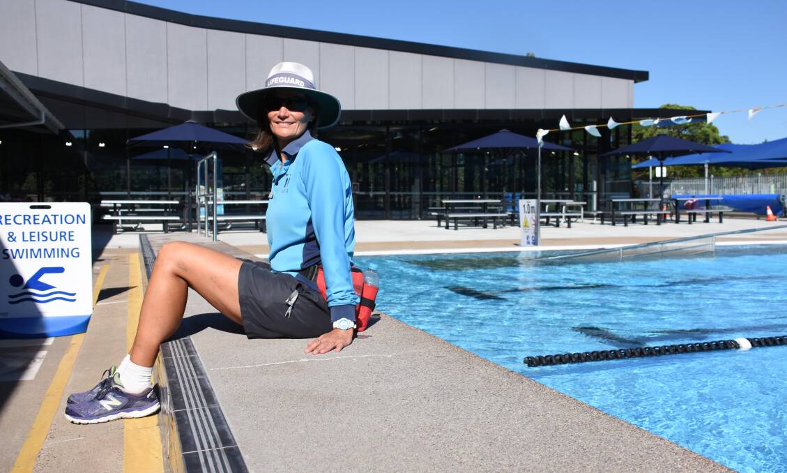 SWIM: Maitland Aquatic Centre lifeguard Renee Grundy beside the outdoor pool, which closes for the season this Sunday. The indoor pool behind remains open all year.