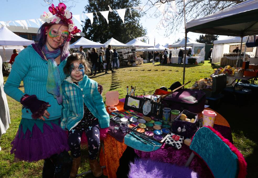 STALL: Jessinta Briton from Pixie Corner and Ivy Scully at an Olive Tree Market at Maitland Regional Art Gallery earlier this year. Picture: Jonathan Carroll