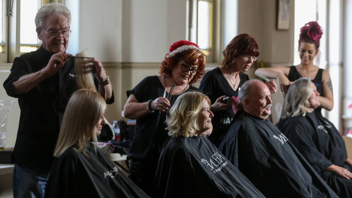 A CUT ABOVE: Robert Threlfo with Kylie, Helen Stuckings with Carol, Lisa Payne with Tim and Brooke Fedasz with Sharon at the Haircuts for the Homeless day. 