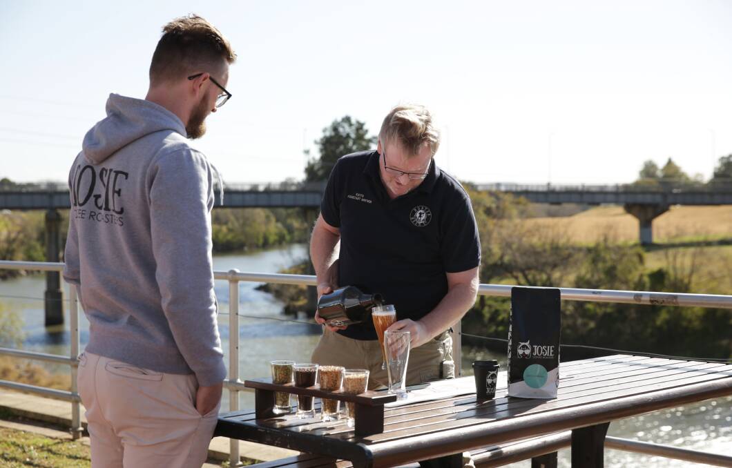 CHEERS: Owner of Josie Coffee Roasters Chris Edden (left) and Head Brewer Hunter Beer Co Keith Grice have collaborated to create a special coffee infused Kolsch beer called Thirsty Merkel which will be available to try at the Aroma Festival this weekend. Picture: Simone De Peak
