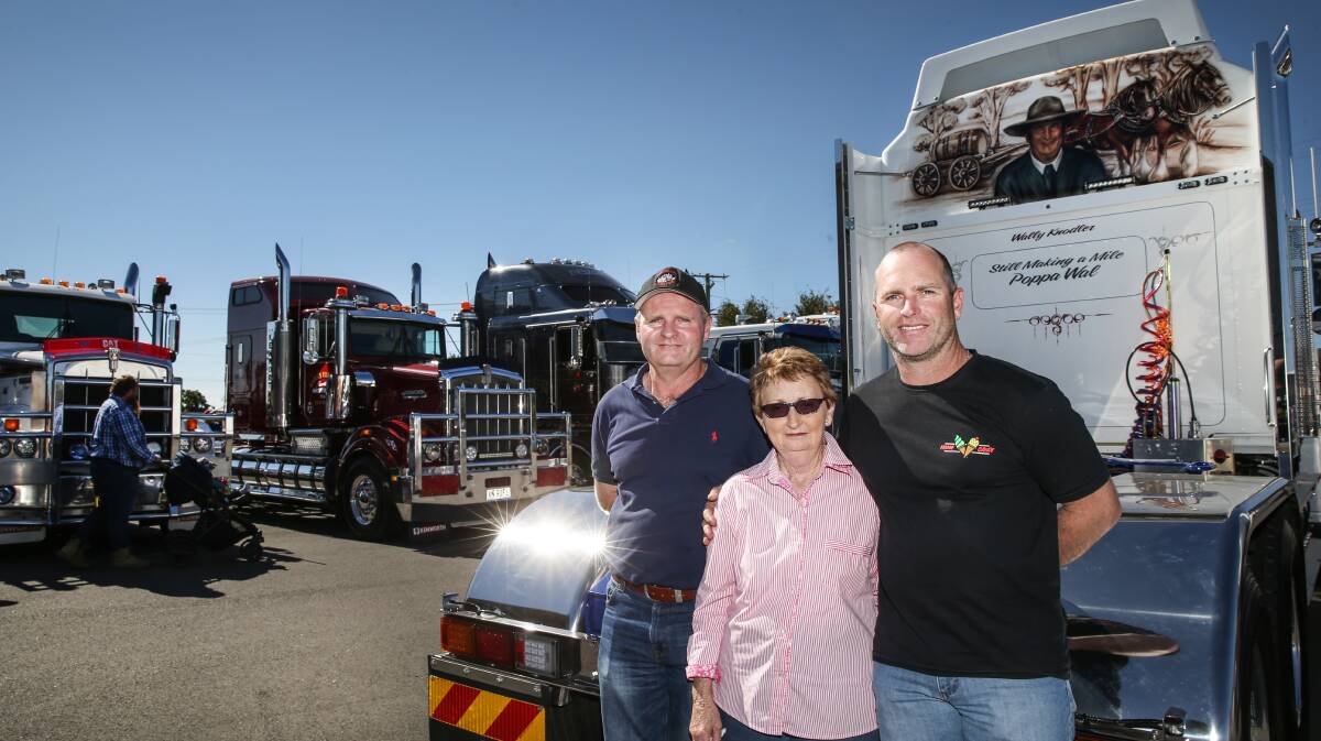 TRIBUTE: Brian, Jan and Paul Knodler pictured with the truck and artwork paying tribute to Jan's husband Wal, who lost his battle with cancer last year. PICTURE: Marina Neil.