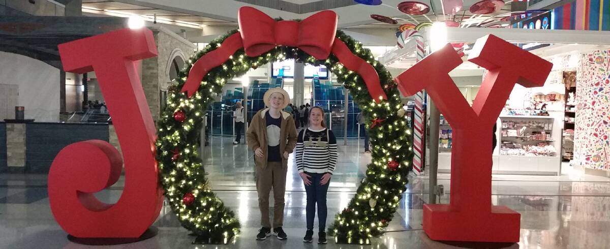 WHAT JOY: Johey and his sister Isabella pictured at the airport before boarding their flight bound for Sydney. PICTURE: Supplied.
