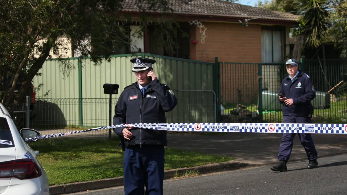 CHARGED: Police at the scene of the Segenhoe Street stabbing on Monday. PICTURE: Simone De Peak.