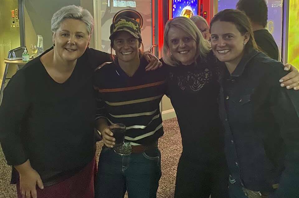 GREAT NIGHT: Travel Guides Stack and Mel meet up with locals Julie Rinkin (left) from Bolwarra Heights and Natalie Brooker from Windella.