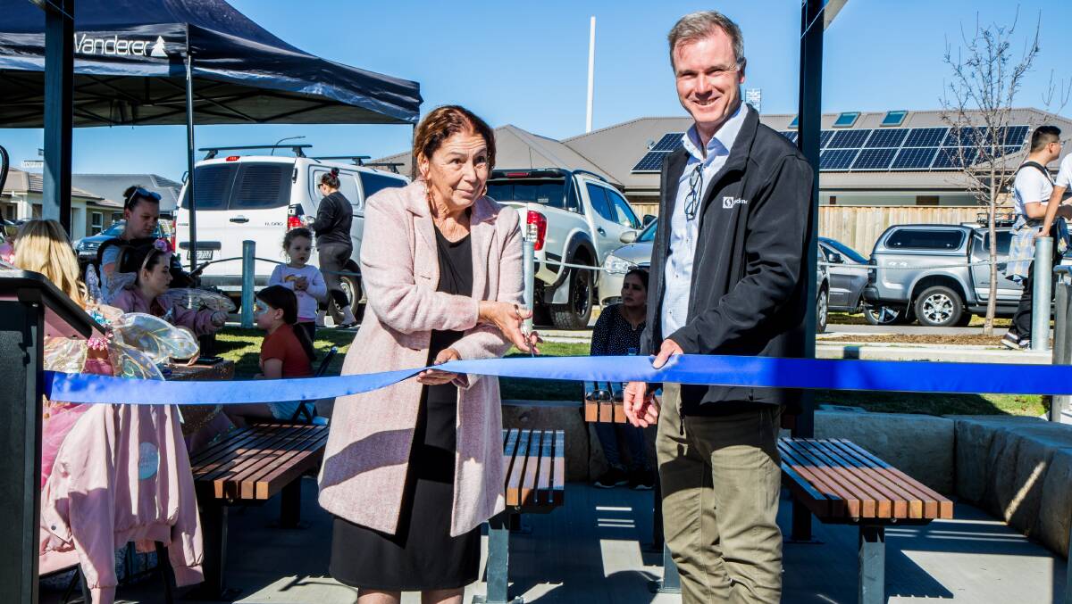 OFFICIALLY OPEN: Mayor Loretta Baker and Project Director Stockland Mike Milligan at the ribbon cutting to officially open the new park in McKeachies Run.