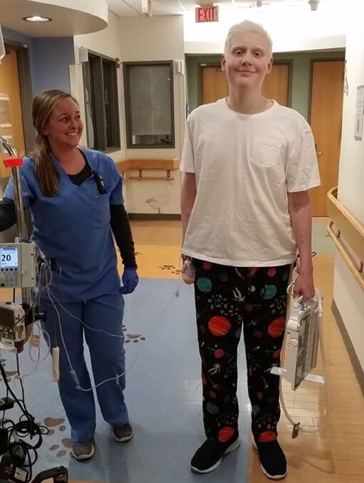 ALL SMILES: Johey Basedow is on the long road to recovery after his marathon 20-hour surgery to remove 3000 tumours. PICTURE: Supplied.