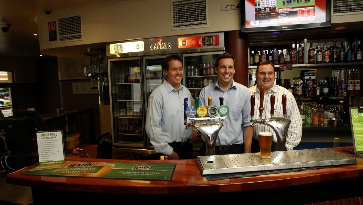 Josh, Nick and Luke Murphy pictured in the main bar of The Belmore Hotel.