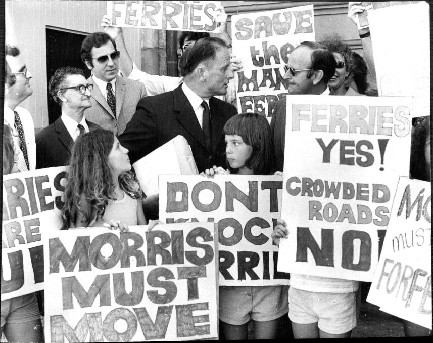 POLITICIAN: Former Transport Minister Mr Morris (centre) is pictured during a protest at Manly in January 1974.
