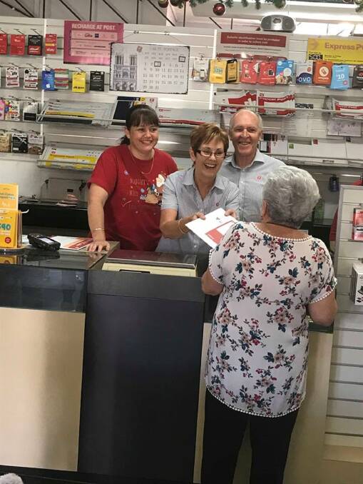 STAMP OF APPROVAL: Rutherford Post Office employee Rebecca Burton (left) with Marguerite and Grant Booth who have called it quits after 25 years at Rutherford Post Office. 