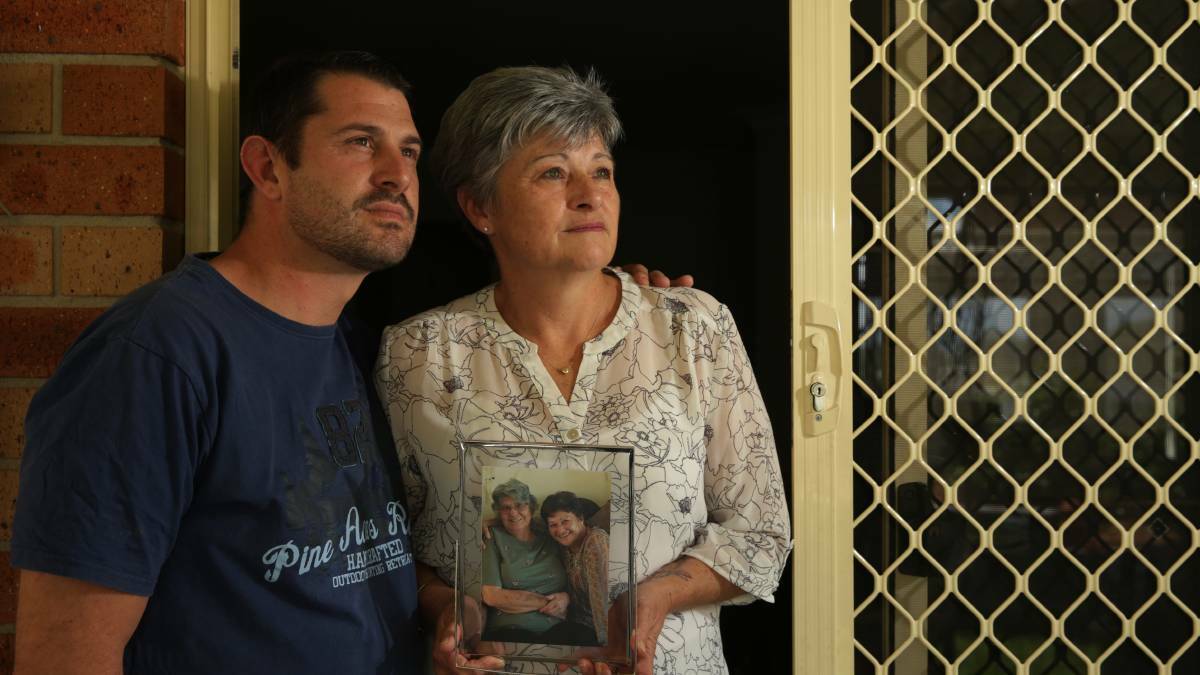 CHANGES: Josef Krausert-O'Connor pictured with his mum Anna Krausert who is holding a picture of her mum Elizabeth O'Kane. They are fighting for a review of the State's death verification protocols. Picture: Simone De Peak. 