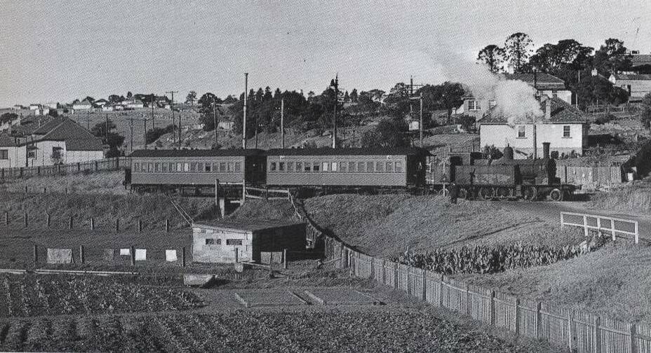 1953: Steam locomotive 2021 crossing Melbourne Street near Morpeth Road. This picture was taken near where the roundabout is situated today. 