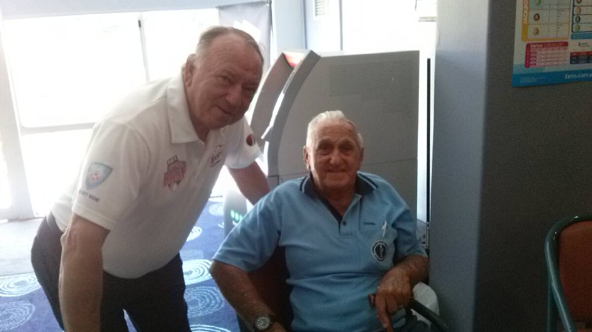 WITH A LEGEND: Dennis with former Test cricket great Doug Walters.