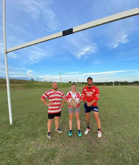 SEEING RED: Captain-coach Josh Papworth with Lilly-Bree Humbles and Geordie Connelly who are looking for recruits for the new season. 