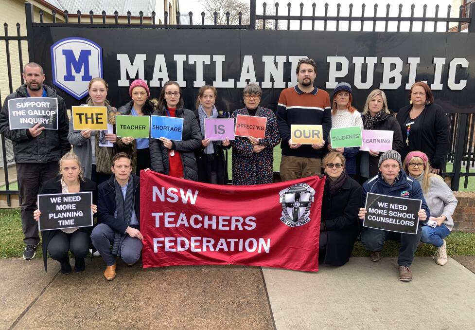 WALK OUT: Staff at Maitland Public School gather during Thursday's walk out.