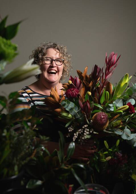 FLOWER FRENZY: Pip Passfield owner of Maitland City Florist said it will be open Friday from 8:30am until 4:30pm and Saturday from 9am-2pm and can deliver to Newcastle, Lake Macquarie and Maitland areas. Picture Marina Neil