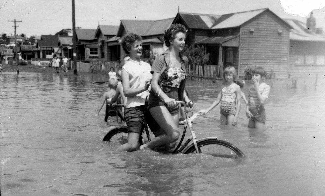 Hard work on the bike in 1955.