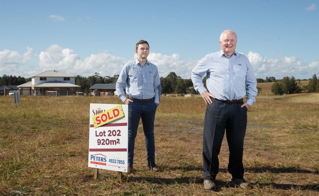 BIG WEEK: Lachlan Doyle and Tim Peters from Peters Real Estate at the St Helena housing development in Lochinvar. Picture Max Mason-Hubers. 