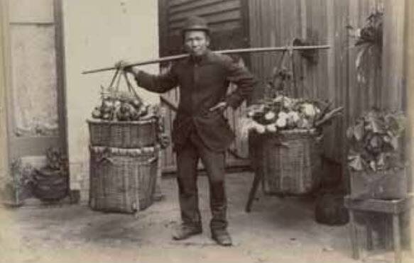 A Chinese gardener, with produce to sell.
