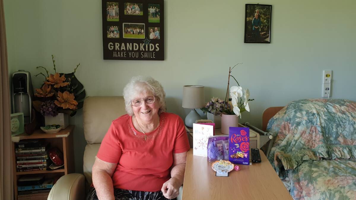 THE SIGN SAYS IT ALL: Ruth Trappel, and her 'grandkids make you smile' sign on her wall.