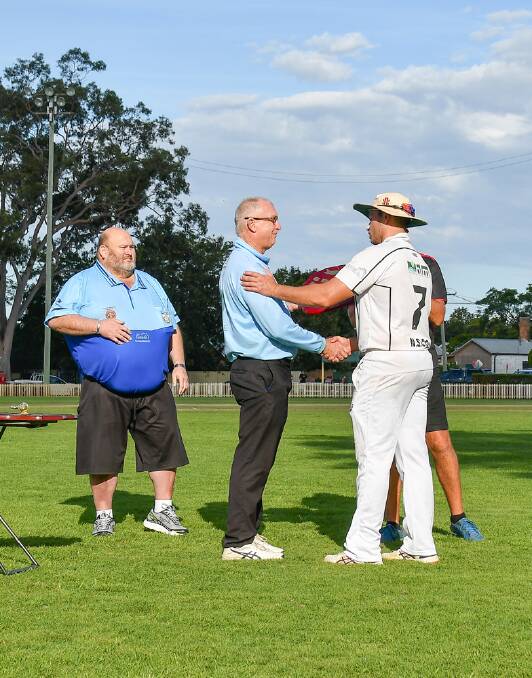 Norths captain Lincoln Mills receives the Player of the Final award.