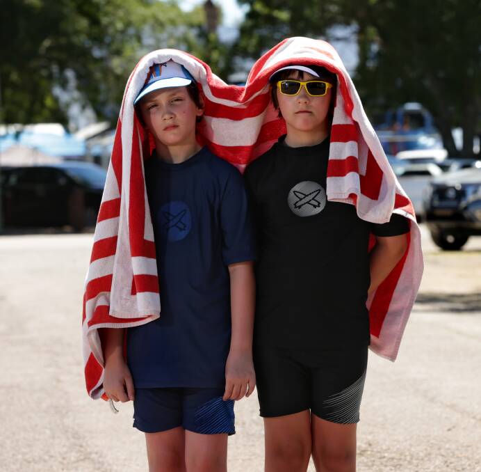 KEEPING COOL: As far as twins Aidan and Liam Dawes of Paxton were concerned, Maitland Pool was the only place to be to beat the heat. Picture: Simone De Peak.