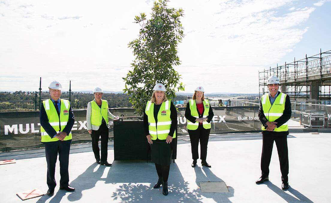HITTING THE HEIGHTS: Hunter New England Local Health District Chief Executive, Michael DiRienzo Health Infrastructure Executive Director Rural and Regional, Gillian Geraghty, Minister for Mental Health Bronnie Taylor, Member for Maitland Jenny Aitchison and and Multiple, Regional Managing Director NSW, David Ghannoum on the helipad at the Topping Out ceremony. 