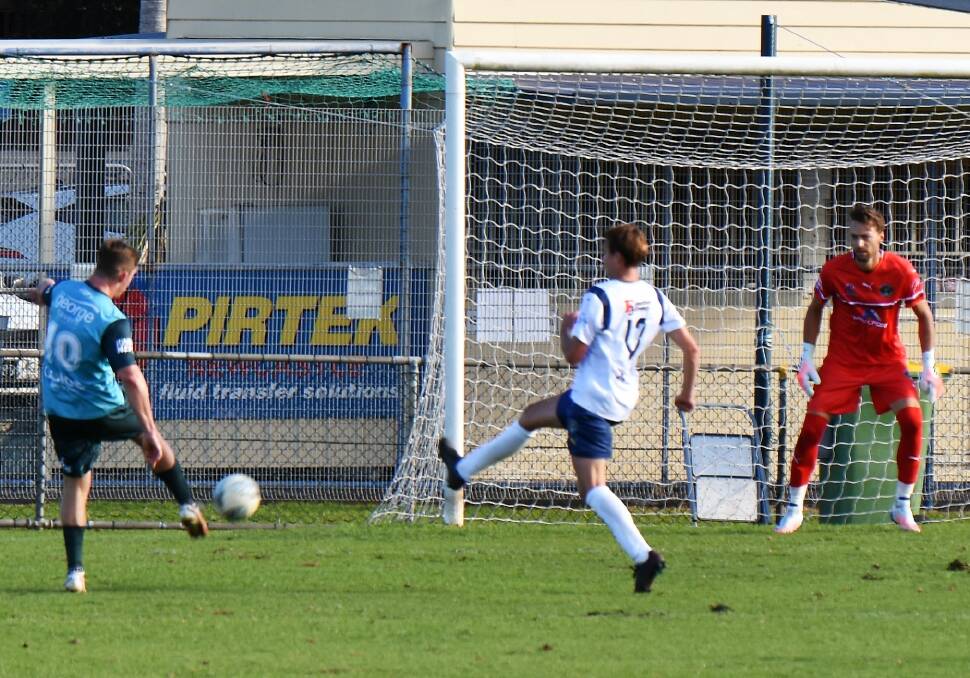 GOAL: James Thompson slots home Maitland's opening goal against Lake Macquarie after cutting in from the left wing. Picture Katrina Hackett.