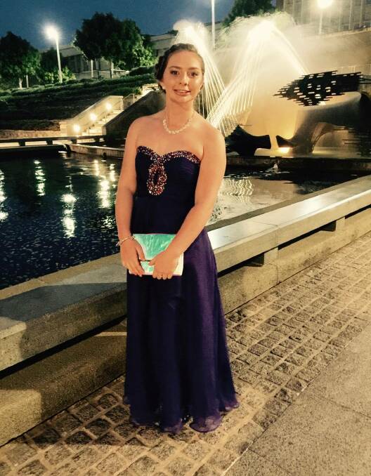 LOOKING GREAT: Maddi Elliott on the way to her school formal on Friday.
