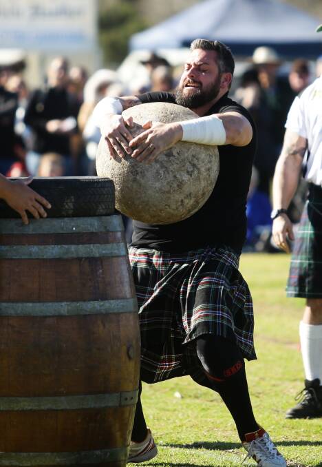 VERSATILE: Kurt competes in a variety of strongman contests, this one the Aberdeen Highland Games. 