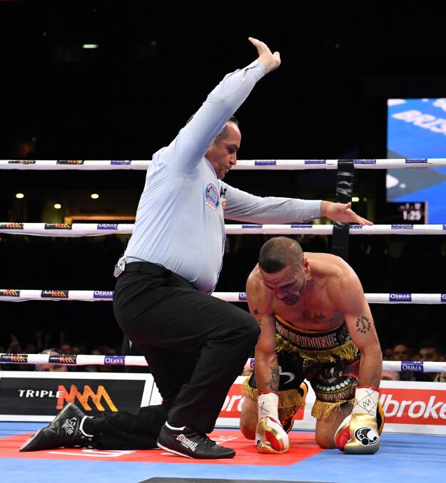 DOWN AND OUT: The end of Anthony Mundine's career, knocked out in the first round by Jeff Horn. Picture AAP. 