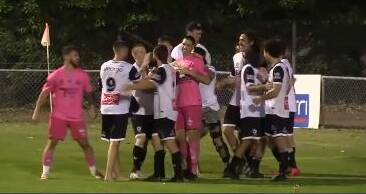 The Magpies players celebrated their penalty shootout win against Charlestwon Azzurri.