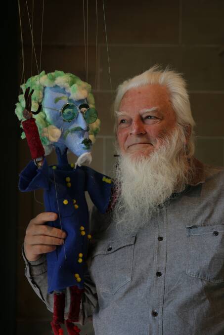 CREATIVE MIND: Frank Oakes with a wizard called Cleverbloke, which is part of The Myth of the Angry Wizards of Maitland collection. Picture: Simone De Peak
