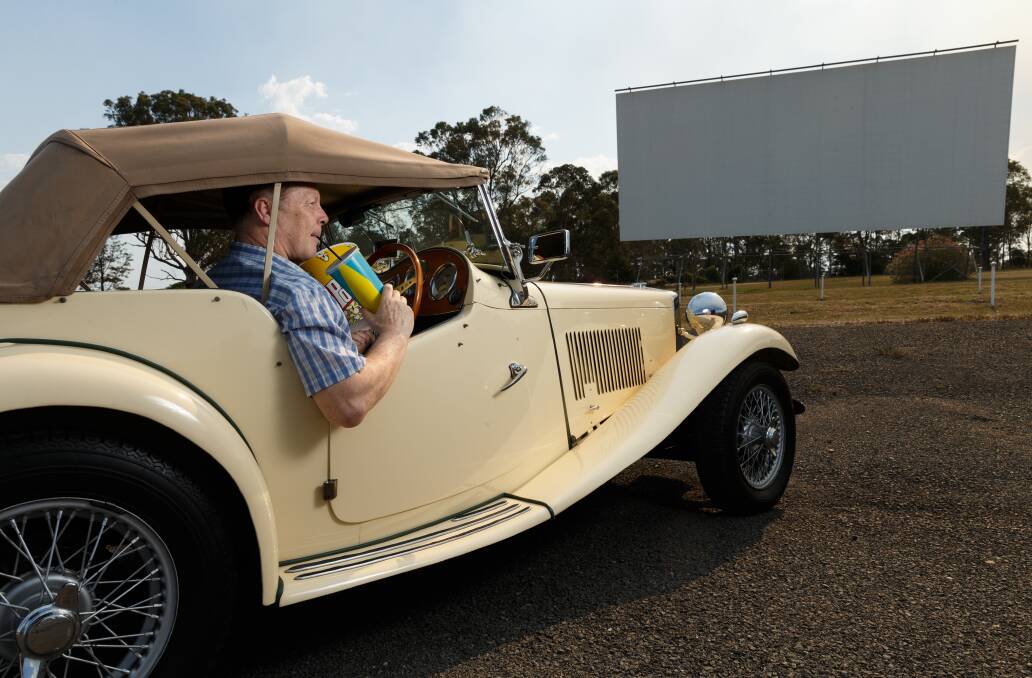  SHOWTIME: Drive-In owner Scott Seddon in a classic 1950 MG, ready for the 50th anniversary screening of To Sir With Love. Picture: Max Mason-Hubers.