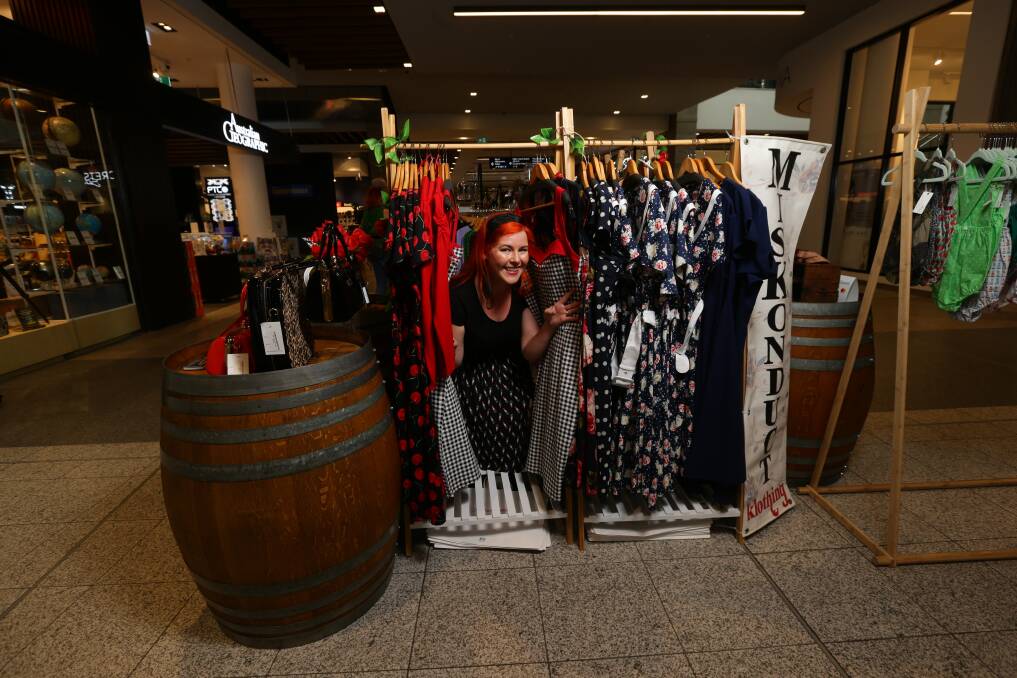 BARREL OF FUN: Alice Turnbull from Miskonduct klothing at the June Green Hills indoor markets. Pictures: Jonathan Carroll