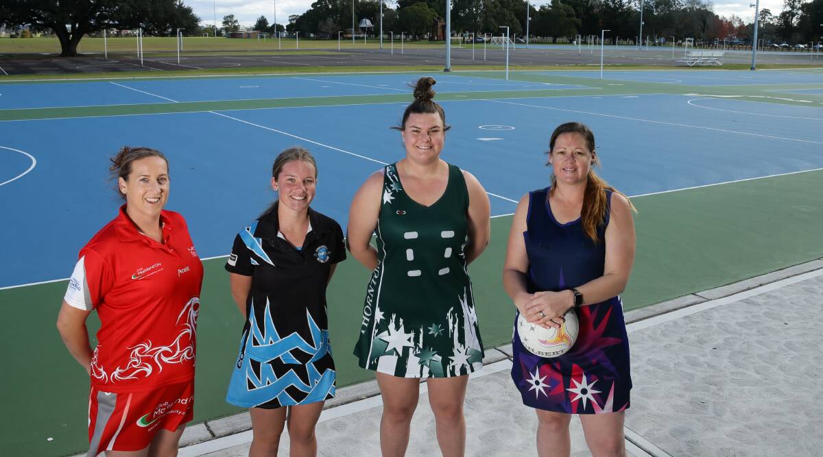 RACE IN FOUR: Club Maitland City's Kath Anderson, NVY Comets' Jess Mossman, the George's Tayla Winter and Hills' Mel Morris whose teams all have eyes on the A grade netball title. Picture Jonathan Carroll.