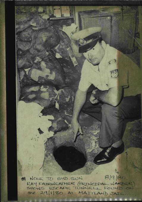 Ray Fairweather shows an escape tunnel found in the grounds of Maitland Gaol on January 29, 1980.