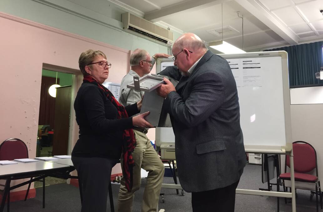 Council election heats up: Returning officer Kevin Short draws from the ballot box on Wednesday afternoon. Photo: Lachlan Leeming. 
