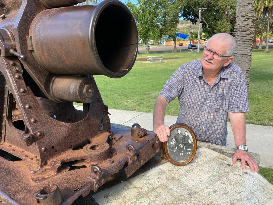 RARE: Greg Powell with his grandfather's map and a WW1 German short-barrelled trench mortar in Speers Point Park. 