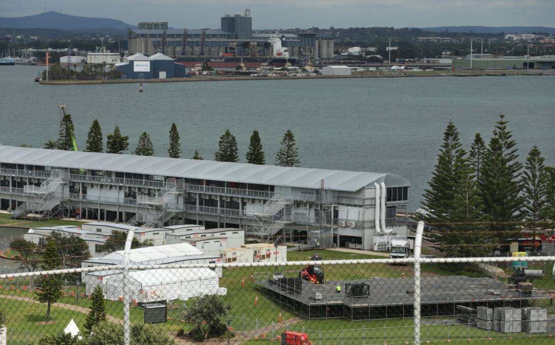 The concert stage, right, under construction at the foreshore on Friday. Picture: Simone De Peak