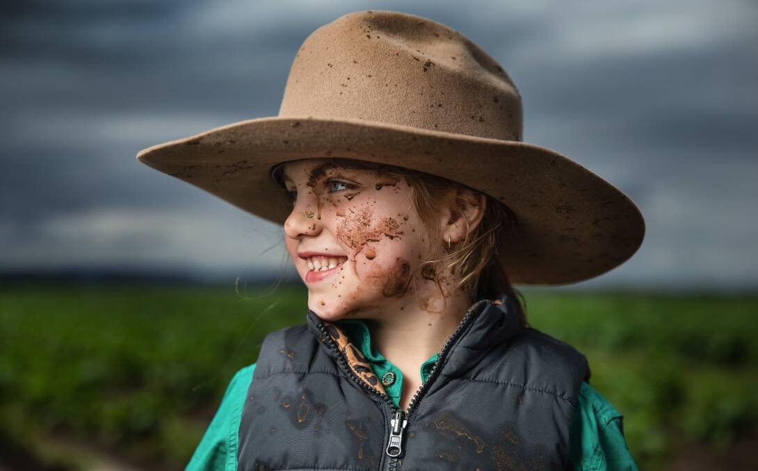 Six-year-old Tahlia Osborn playing in a waterlogged potato field at Pitnacree, near Maitland, on Sunday. Picture by Marina Neil
