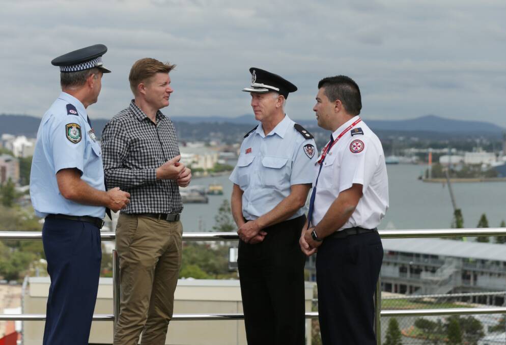 OUT IN FORCE: Police Assistant Commissioner Max Mitchell, Supercars event manager Kurt Sakzewski, NSW Fire and Rescue Zone Commander Superintendent Greg Windeatt and NSW Ambulance's Hunter duty operations manager Luke Wiseman at Fort Scratchley on Friday.
