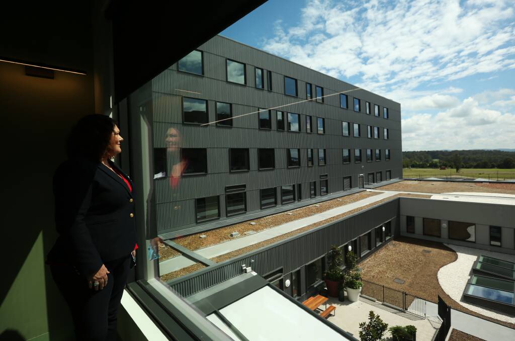 Room with a view: Federal MP Meryl Swanson looks out at the view from inside the new $470 million Maitland Hospital. Picture: Simone De Peak