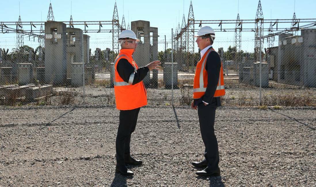 Snowy Hydro chief executive and managing director Paul Broad and Energy Minister Angus Taylor at the Kurri site. 