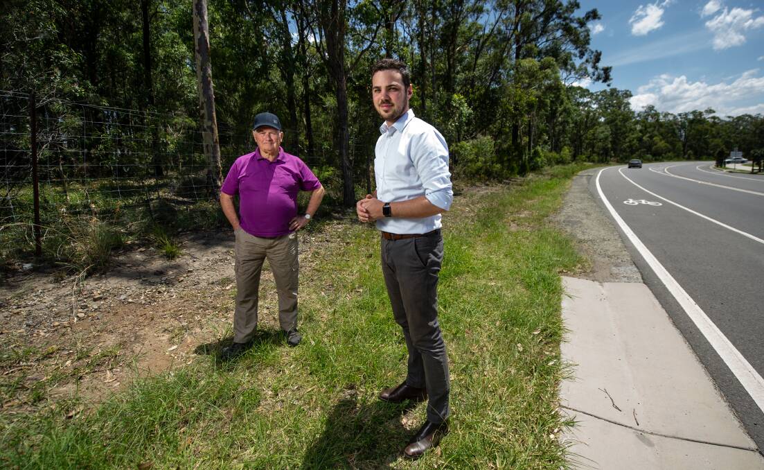 Seeking a way forward: Brian Purdue and Declan Clausen at 505 Minmi Road, Fletcher. City of Newcastle hopes the land can be added to the Hunter Green Corridor. Picture: Marina Neil