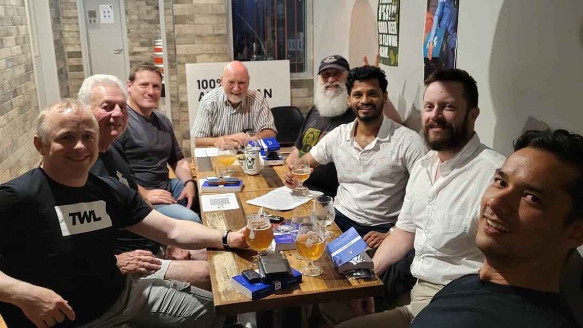 TOUGH TALK: The Tough Guy Book Club is bringing robust discussion back to the pub. Pictured: Members of the Altona Chapter. Vince Bartilotta is pictured second from left. 