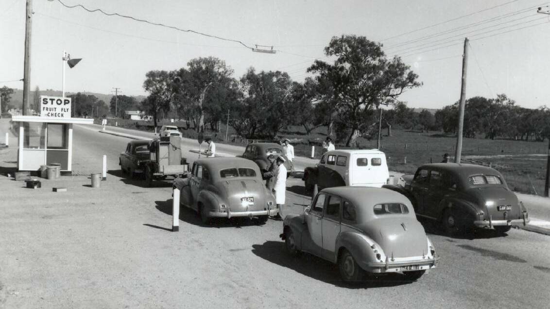 Flashback: Cars at the fruit fly post at the Murray River entrance to Wodonga in 1961. Traffic was monitored there from 1958 to 1980. Picture: WODONGA HISTORICAL SOCIETY