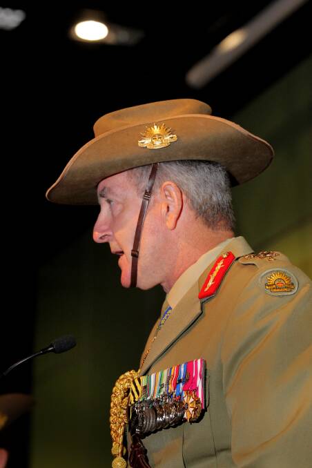 Saddened: Wangaratta RSL sub-branch president Ash Power speaks at an Anzac Day gathering in 2015 after retiring from the army the previous year.